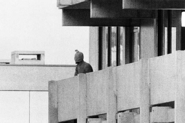 On Sept. 5, 1972, a Palestinian commando group seizes the Israeli Olympic team quarters at the Olympic Village in Munich, Germany. A member of the commando group is seen here as he appears with a hood over his face on the balcony of the building, where they hold several Israeli athletes hostage.
                                 AP photo